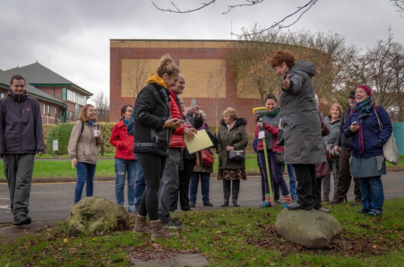 Former residents stand on the exact spot of their old homes in Greenheys.